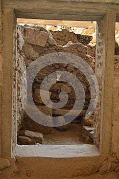 Kitchen Seen Through a Door Dating from the Minoan Civilization in the Archaeological Site of Acrotiri. Archeology, History, Trave photo