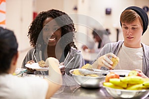 Kitchen Serving Food In Homeless Shelter