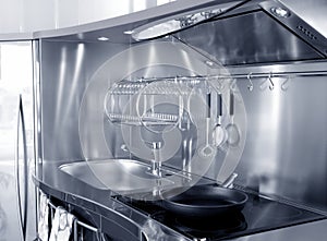 Kitchen silver sink and vitroceramic stove hob photo