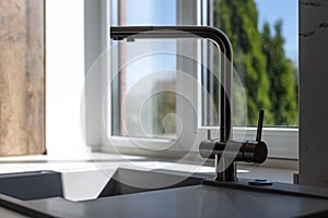 Kitchen sink with faucet