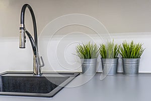 Kitchen sink and faucet in house interior, Kitchen background modern style