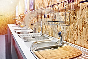 Kitchen sinks and faucets in store