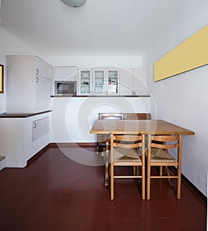 Kitchen of a small intimate and very cozy apartment. photo
