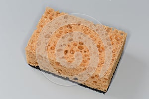 Kitchen soft synthetic cleaning sponge with hard urethane abrasive layer