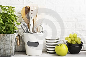 Kitchen still life on a white brick wall background