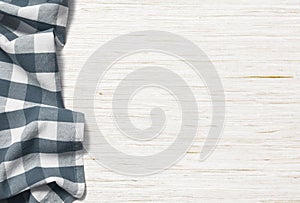 Kitchen table background with picnic cloth photo
