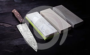 Kitchen Table Displays Large Knife And Sharpening Whetstones Set