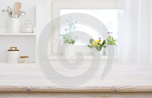 Kitchen table top on blur window sill and shelf background