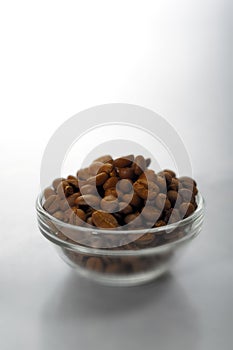 Kitchen things-FOOD Rosted coffeebeans on a white background Lokgram Kalyan