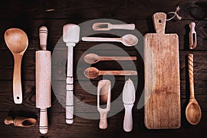 Kitchen tools on a wooden background. Applied toning. Top view.