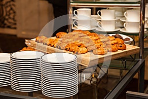 Kitchen tray with the cakes and clean dishes