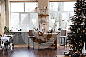 Kitchen with two large windows in light colors