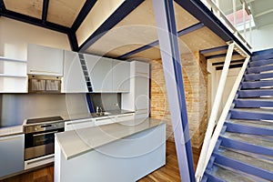 Kitchen under mezzanine