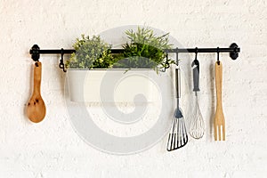 Kitchen utensil hang photo