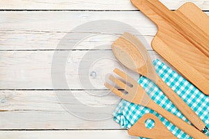 Kitchen utensil over wooden table