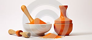 Kitchen utensil set with a wooden spoon and mortar filled with orange powder