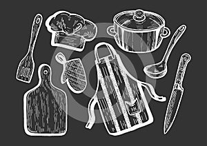 Kitchen utensils on black background