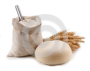 Kitchen utensils, ears, flour in a bag photo