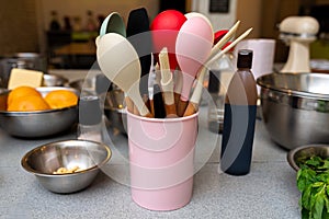 Kitchen Utensils in a Holder on Countertop