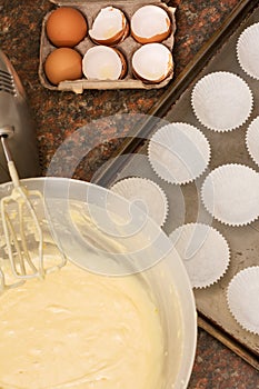 Kitchen utensils, ingredients and batter