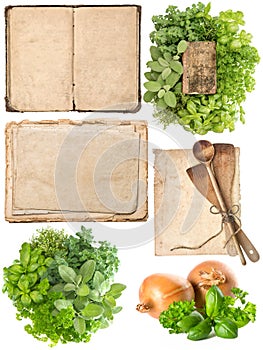 Kitchen utensils, old cookbook, pages and herbs