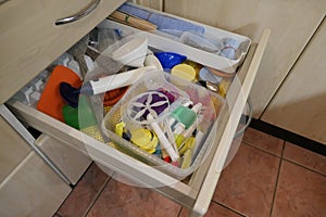 Kitchen utensils in an open drawer