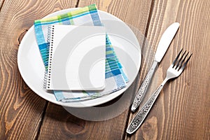 Kitchen utensils over wooden table