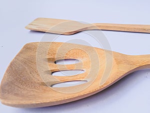 Kitchen utensils set handmade from coconut tree and bamboo wooden on white background.