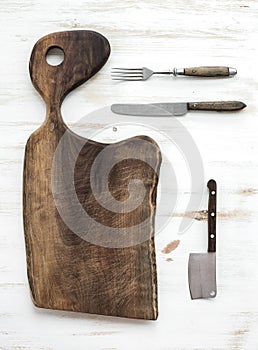 Kitchen-ware set. Old rustic chopping board made