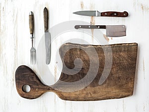 Kitchen-ware set. Old rustic chopping board made