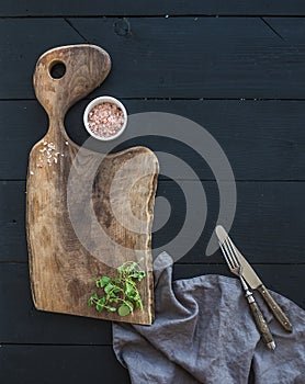 Kitchen-ware set. Old rustic chopping board made