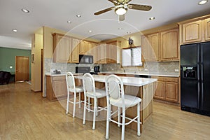 Kitchen with white counter island