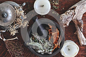 Kitchen witchery - making magickal herb blend for a spell photo