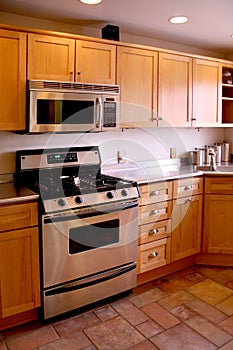 Kitchen wood cabinets stainless stove