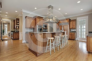 Kitchen with wood and granite center island