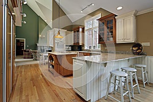 Kitchen with wood and granite island