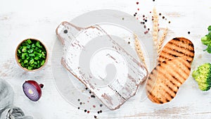 Kitchen wooden board with ingradents. cooking concept. Top view.