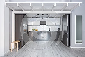 Kitchen with wooden ceiling