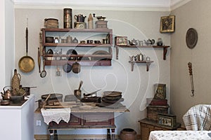 Kitchen. Wooden shelves lined