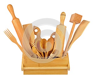 Kitchen wooden utensils (shovel, fork, spoon, etc.) isolated on a white