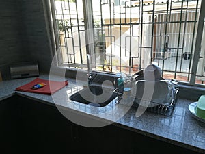 Kitchenette in an office on display - neat basin neat space photo