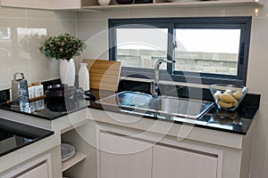 Kitchenware on the marble worktop