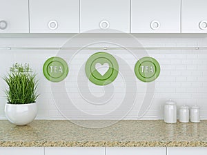 Kitchenware on the marble worktop.