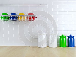 Kitchenware on the wooden worktop.