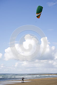 Kite boarder on beautiful beach