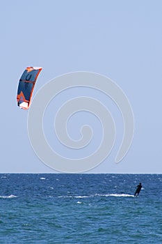 Kite boarder enjoy surfing