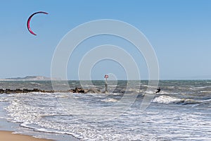 Kite boarder on a sunny day in winter