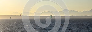 Kite Boarders with Mountain backdrop, Washington sunset