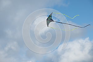 Kite flying against the blue sky