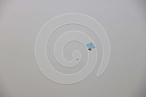 Kite flying in blue sky on kite flying day